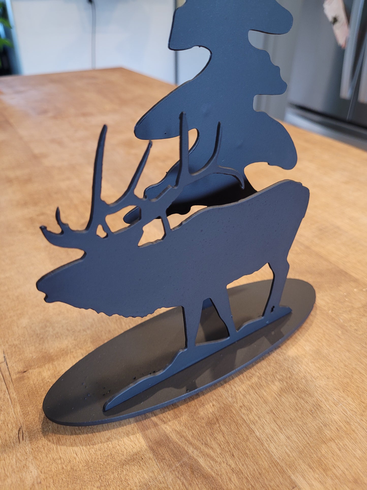 Sculpture - Elk in rut with evergreen tree