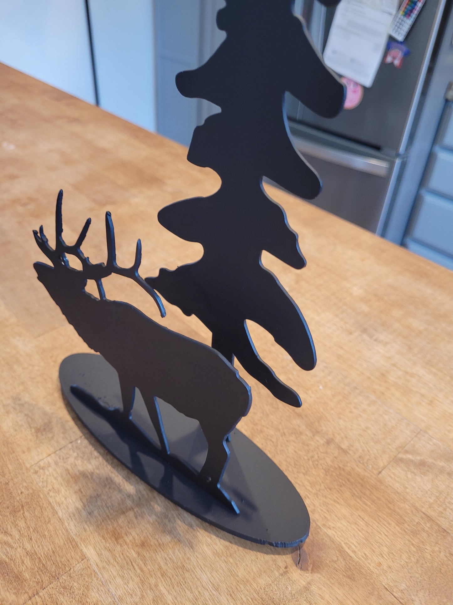 Sculpture - Elk in rut with evergreen tree